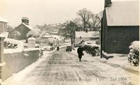 Picture of Looking down the High Street- January 1954